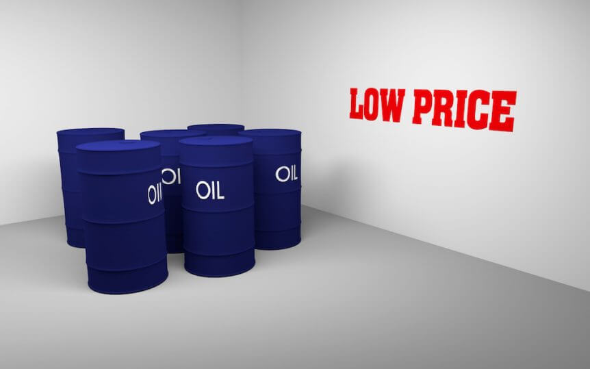 Oil barrels and the word Low Price on the wall